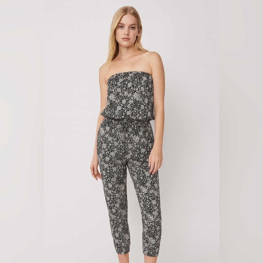 Aritzia - Talula - Tabata Jumpsuit in a black/white floral print. Small